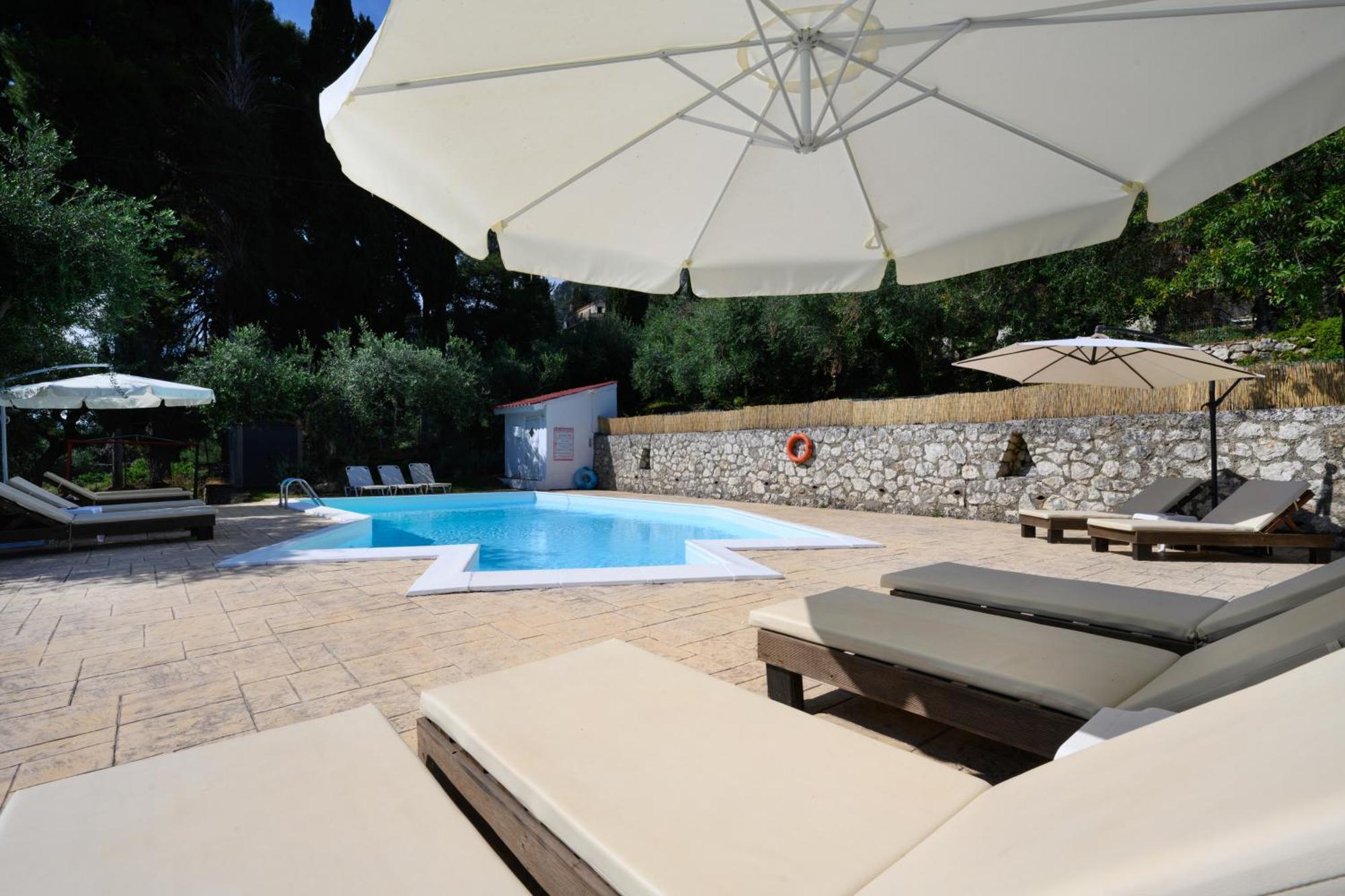 Olive Grove Poolside Apartments Беницес Екстериор снимка
